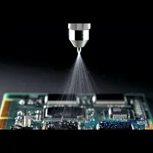 Automated conformal coating system in operation at Key-Tech